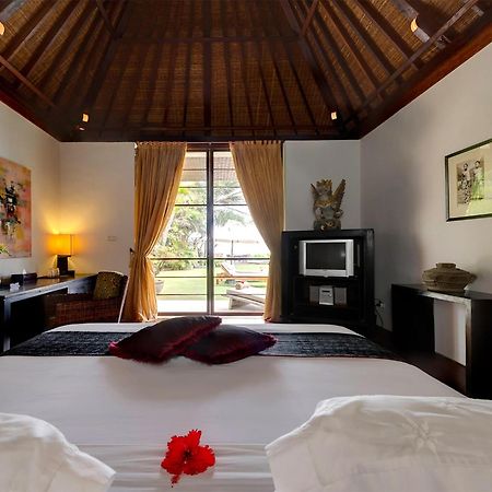 Majapahit Beach Villas By Nakula Ketewel Номер фото